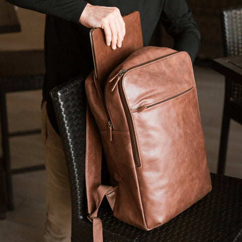 canvas vs leather backpack